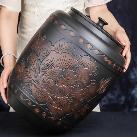 Ceramic Rice Dispenser With Heavy Duty Snap Lid Airtight Bulk Food Storage Container, large black canister with floral design.