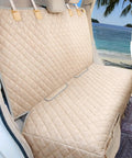 Waterproof Backseat Dog Car Seat Cover Nonslip Protector For Cars Trucks SUVs Beige With Free Dog Barrier And Mesh Organizer Universal Fit For Kids And Pets showing seat installation.