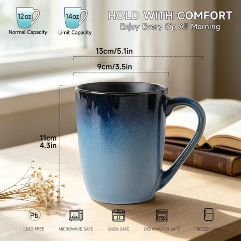 14oz Ceramic Coffee Mugs Set Of 6 With Easy Grip Handle In Ice Snow Blue Glaze With Star Blue Accents And Gold Rim on table