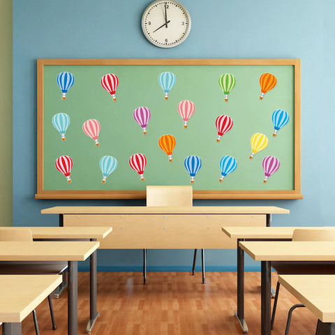 45 Piece Colorful Hot Air Balloon Cutouts For Bulletin Boards And Classroom Decor displayed on a classroom wall