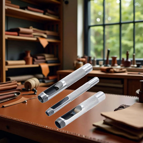 Pro Grade Leather Punch Set With Steel Hollow Punches, three-piece grommet kit on leatherwork table in workshop setting