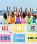 Personalized Wet Dry Mesh Bag Water Resistant Pool Pouch And Travel Organizer with custom initials or names on the beach.