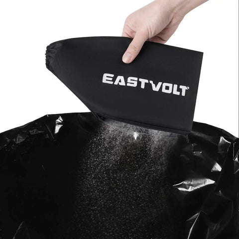 Dust bag from Beast 7 Amp Belt Sander With Six Variable Speed Settings being emptied, highlighting its functionality for clean finishes.