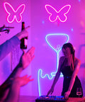 Two Pack Butterfly Neon Sign LED Light Wall Decor Pink Neon Butterfly Wall Art Powered By 3AA Batteries Or USB in a party setting