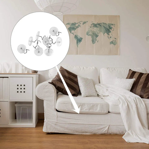 Kickass Upholstery Twist Pins Clear Heads 100 Piece Set displayed on a couch securing a slipcover.