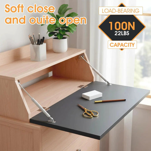Four Pack Drop Down Gas Struts For Drop Front Desks, 100 Newtons, shown installed on a wooden desk with open lid