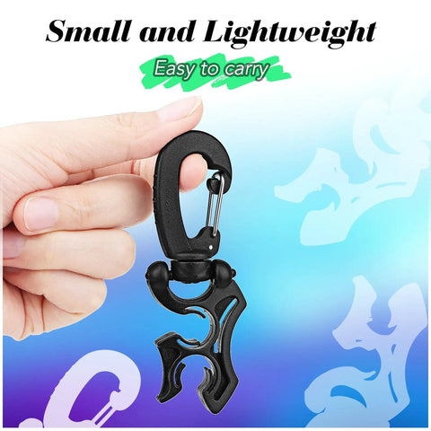 Hand holding Black Three Pack Diving Hose Holder Clips For BCD Hose Management Double Hose Clips With Snap Hook Buckle