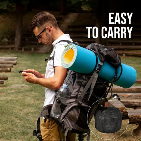 Man carrying backpack with attached camping gear and Stovetop Camping Kettle 2.2 Liter Teapot for Boiling Water and Tea Brewing