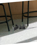Outdoor Cushion Fasteners 4 Pack Rattan Furniture Clips for Patio Sofas and Sectional Chairs on a floor