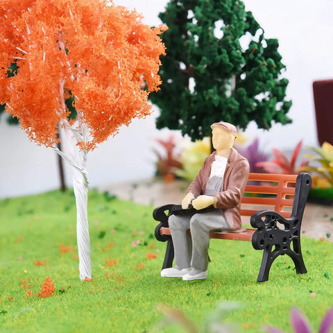 Eight Piece 1 To 24 Scale Mini Park Street Bench Set For Dollhouse And Fairy Garden Brown Tiny Benches in a colorful landscape.