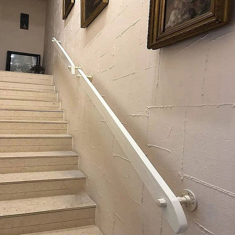 Antislip Round Solid Wood Stair Handrail Wall Mounted Elderly Support Safety Rail For Indoor Hallway And Stairs 20 Feet Long With Durable White Finish, installed along stairs.