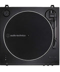 Bluetooth Fully Automatic Belt Drive Turntable With Dust Cover And Die Cast Aluminum Platter Includes 3 Inch Powered Bluetooth Studio Monitors Pair For A Dope Crystal Clear Home Audio Setup, top view of black platter with tonearm.