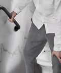Workhorse Grade 16 Inch Black Shower Grab Bars Two Pack Heavy Duty 304 Stainless Steel Bathroom Safety Handles in use for support.