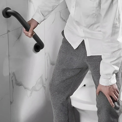 Workhorse Grade 16 Inch Black Shower Grab Bars Two Pack Heavy Duty 304 Stainless Steel Bathroom Safety Handles in use for support.