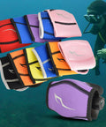 Various colors of neoprene and nylon diving regulator covers for second stage head shield, shown with scuba diver in background.