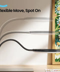 Adjustable 10X Magnifying Glass With Light And Stand, 144 LED Desk Lamp, shown flexibly angled for crafts and reading.