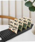 ESD Safe Circuit Board Storage Stand and Anti Static Rack for PCB Repair holding circuit boards on a white table.
