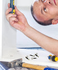 Person assembling furniture using 30 Sets M6 Cam Lock Fittings Furniture Hardware Fastener Kit With Zinc Alloy And Plastic Three In One Connectors