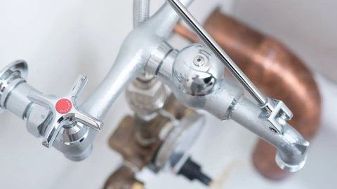 Close-up of Commander Wall Mount Service Sink Faucet With 8-Inch Centers, Rough Chrome Finish, Brass Top Brace Assembly.