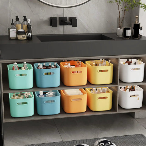 10 Pack Colorful Plastic Storage Bins With Handles For Shelves Or Cabinets Durable Organizer Boxes in a bathroom setting
