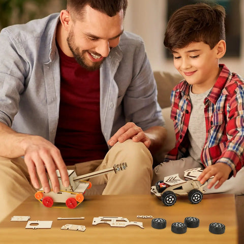 Father and son assembling Wooden STEM Kits For Kids Aged 8 To 12 Six Build Your Own Car And Science Projects Pack