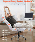 Reclining Office Chair With Footrest For Big And Tall Pros Oversize PU Leather Executive Chair With Lumbar Support in use.