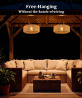 Laid Back Vibes 13 Inch Battery Powered Rattan Chandelier With Adjustable Brightness Dimmer And Timer For Gazebo Patio Or Pergola waterproof pendant light above a cozy outdoor seating area.