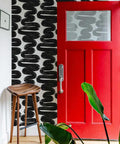 Entryway with Removable Peel And Stick Black And White Wiggle Room Wallpaper For Easy Mess Free Self Adhesive Wall Covering No Residue Left Behind DIY Friendly Mid Century Modern Vibe Made In The USA 20.5-Inch By 16.5-Foot behind red door