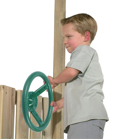 Child playing with green steering wheel, part of Kids Outdoor Playground Accessories Swingset Attachments With Pirate Ship Wheel.