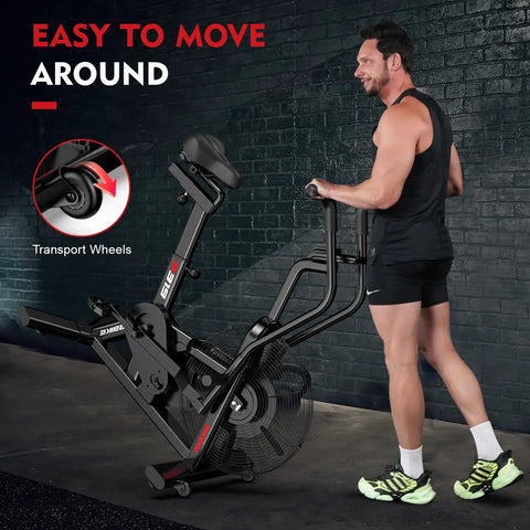 Man moving Air Resistance Fan Bike With Dual Action Handlebars And Dual Layer Transmission For Home Gym HIIT Cardio Full Body Workout