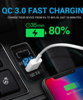 Blue Dual Port PD And QC 3.0 Fast Car Charger With Bright LED Voltmeter displaying charging status in a vehicle socket.