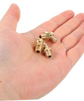 9 Piece Grease Fitting Assortment Kit With Copper Nipples for cars and trailers held in a hand showing size and design details.