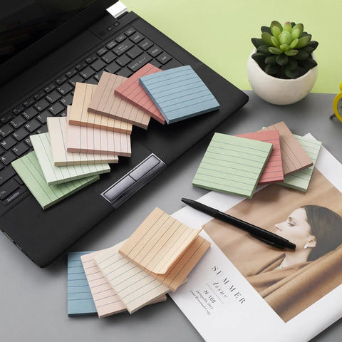 16 Pack Lined Sticky Notes 3 By 3 Inches Ruled Memo Pads With Super Sticky Power In Vintage Colors scattered on desk near laptop