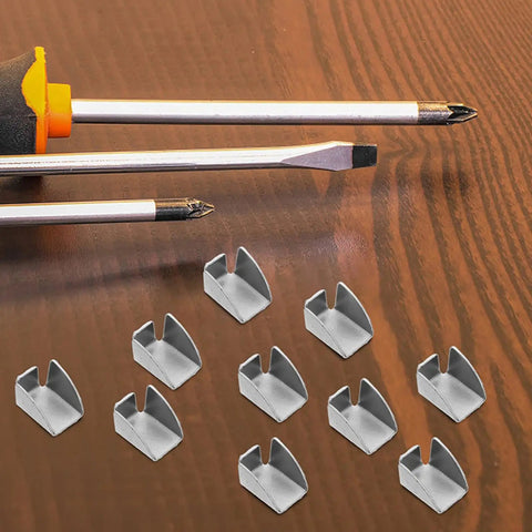 Heavy Duty Silver Adjustable Pilaster Shelf Clips Pack of 30 for Metal and Wood Shelves with tools on wooden surface