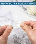Hands holding Mini Clear Plastic Bags For Jewelry And Beads On The Go, 200 Pcs Resealable 1.57 By 2.36 Inch Baggies, 2.4 Mil Thick LDPE