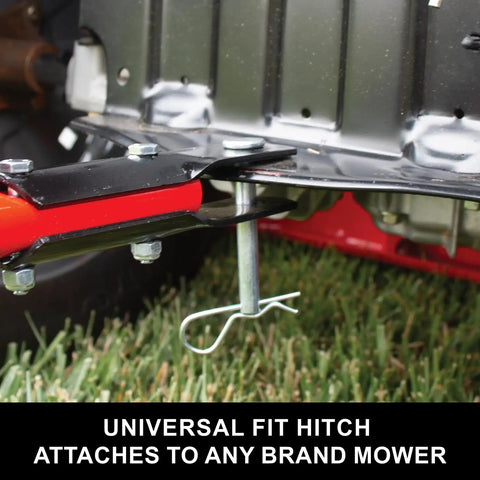 Close-up of 85 Lb Tow Behind Broadcast Spreader's universal hitch attached, showing heavy duty frame for easy mower connection.
