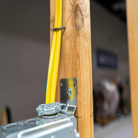Simpull Solid Indoor 12/3 NM-B Copper Wire With Ground W/G, Easy Pull Jacket installed in residential wiring frame