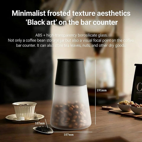 Vacuum Coffee Bean Storage Container Keeps Your Morning Stash Staying Crisp, 650 ml frosted glass jar on kitchen counter.