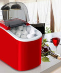 Fast Acting Countertop Ice Maker With Quick Six Minute Ice Cube Production And Thirty Three Pounds Daily Yield. Red design on kitchen counter.