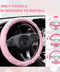 Cute As Heck Pink Steering Wheel Cover With Diamond Bling And Smooth Leather Grip installed on steering wheel, showing installation steps.
