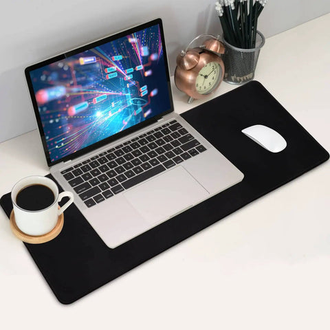 Gamer-Grade Extended Mouse Pad With Stitched Edges And Non-Slip Natural Rubber Base, 27.6 By 11.8 Inches under a laptop and mouse