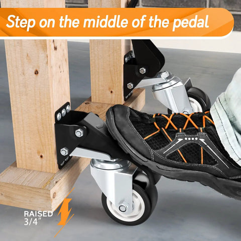 Person stepping on pedal of Heavy Duty Retractable Caster Wheels Set Of 4 For Workbench And Machinery Benches 880 Lb Capacity