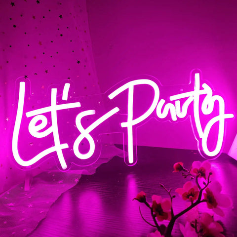 Lit Dimmable LED Neon Sign For Wall Decor 16x7 Inches White Neon Art Light in pink with 'Let's Party' text glowing in dark room