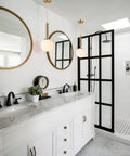Modern Globe Pendant Light For Kitchen Island White Milk Glass With Brass Finish hanging over double vanity in bathroom