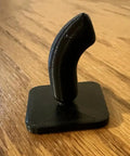 Heavy Duty Garage Shelf Hook For Keyhole Slots, black hook on wooden surface, durable workshop organizer accessory