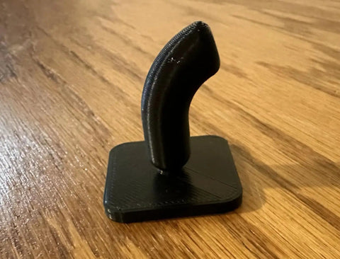 Heavy Duty Garage Shelf Hook For Keyhole Slots, black hook on wooden surface, durable workshop organizer accessory