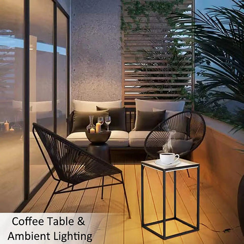 Outdoor seating with Dope LED End Table With Lamp Bedside Nightstand And Coffee Table Black Geometric Rectangle Metal Desk in evening light.