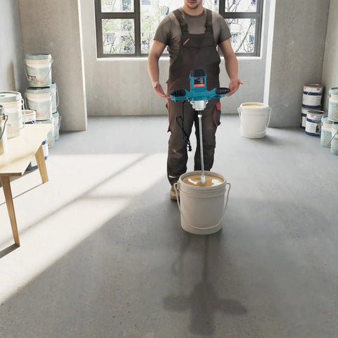 Person using Beefy 2100W Electric Cement Mixer Handheld Portable Concrete And Mortar Mixer in workshop with buckets of paint.