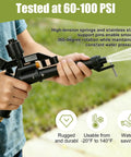 Person holding 360 Degree Rocker Arm Sprinkler System for Yard and Farm Irrigation with 50 feet spray reach