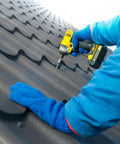 Installation of Heavy Duty Number 10 X 1 Inch Metal Roofing Screws Pack Of 80 Black Rustproof Hex Heads with drill.
